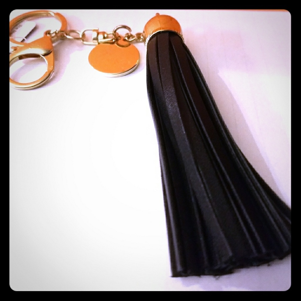 Cute, on-trend black tassell keychain